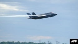 FILE - This Sept. 16, 2016 US Air Force handout photo shows a US Marine F-35 Lightning II taking off at Tyndall Air Force Base in Florida.