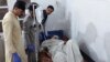 Gunmen massacre dozens of passengers in Pakistan