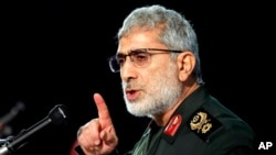 FILE - Gen. Esmail Qaani, head of Iran's Quds Force, speaks during a ceremony in Tehran, Iran, Jan. 1, 2021. Qaani is one of seven people sanctioned by the United Kingdom on Dec. 14, 2023.