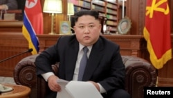 North Korean leader Kim Jong Un poses for photos in Pyongyang in this Jan. 1, 2019, photo released by North Korea's Korean Central News Agency (KCNA). 