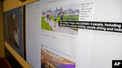 FILE - New facial recognition technology is demonstrated via a teleconference at Facebook headquarters in Menlo Park, Calif.,Dec. 18, 2017.