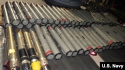  The crew of the USS Normandy seized this illicit shipment of weapons and weapon components intended for the Houthis in Yemen, aboard a stateless dhow in the Arabian Sea, Feb. 9, 2020. (U.S. Navy photo) 