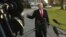 President Donald Trump speaks to reporters on the South Lawn of the White House in Washington, Dec. 4, 2017.