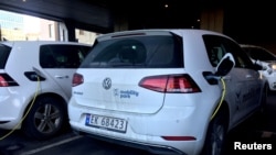 FILE - Electric cars are being recharged in Oslo, Norway, Jan. 2, 2019.