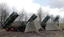FILE - A view shows a new S-400 "Triumph" surface-to-air missile system after its deployment at a military base outside the town of Gvardeysk near Kaliningrad, Russia, March 11, 2019.