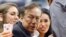 FILE - Los Angeles Clippers owner Donald Sterling, center, and V. Stiviano, right, watch the Clippers play the Sacramento Kings.