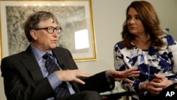 FILE - Bill and Melinda Gates talk to reporters about the 2016 annual letter from their foundation, the Bill and Melinda Gates Foundation, in New York, Feb. 22, 2016. Researchers are trying to infect mosquitoes in Brazil and Colombia with a type of bacteria that could prevent them from spreading Zika virus and other dangerous diseases.
