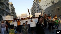 ក្រុម​សកម្មជន​បាន​ជួប​ជុំ​គ្នា​នៅ​ទីក្រុង​ Aleppo ប្រឆាំង​នឹង​អង្គការ​សហប្រជាជាតិ ចំពោះ​អ្វី​ដែល​ពួក​គេ​និយាយ​ថា​ជា​បរាជ័យ​របស់​របស់​អង្គការ​នេះ​ក្នុង​ការ​បណ្តេញ​ពួក​ឧទ្ទាម​ចេញ​ពី​តំបន់​នេះ។