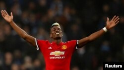 Paul Pogba de Manchester United jubile après la victoire de son équipe contre Manchester City 3-2 au Stade Etihad, Manchester, 7 avril 2018.