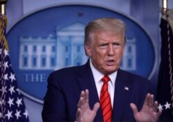 FILE - U.S. President Donald Trump responds to questions from members of the news media during a news conference at the White House in Washington, Aug. 31, 2020.
