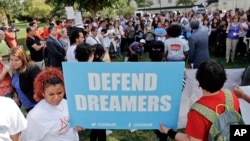 Immigrant rights supporters gather at the U.S. Capitol in Washington, Sept. 26, 2017. 