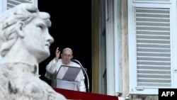 Pope Francis delivers his blessing in St. Peter's Square at the Vatican on Jan. 6, 2024. In his Epiphany Day Mass homily, Francis urged the Catholic Church not to fracture into groups over “ecclesiastical ideologies.”