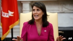Outgoing U.S. Ambassador to the United Nations Nikki Haley speaks during a meeting with President Donald Trump in the Oval Office of the White House, Oct. 9, 2018.