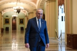 Senate Minority Leader Sen. Chuck Schumer of N.Y. walks on Capitol Hill in Washington, Jan. 3, 2020.