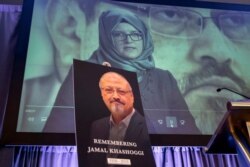 FILE - In this Nov. 2, 2018, photo, a video image of Hatice Cengiz, fiancee of slain Saudi journalist Jamal Khashoggi, picured below, is displayed during a memorial event in Washington, Oct. 2, 2018.