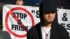 People attend news conference against NYPD's "stop-and-frisk" policies outside the Federal Court, New York, Nov. 1, 2013.