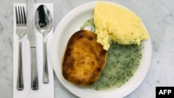 A typical portion of pie and mash at G Kelly in east London, Feb. 19, 2025. A campaign to get pie and mash special protected status is gaining ground.