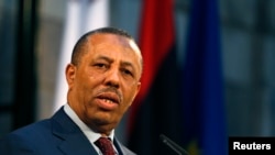 FILE-Libya's Prime Minister Abdullah al-Thini takes part in a news conference in Valletta, Malta, Oct. 21, 2014