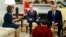FILE - Vice President Mike Pence, center, looks on as House Minority Leader, now House Speaker, Rep. Nancy Pelosi, and President Donald Trump argue during a meeting in the Oval Office of the White House, Dec. 11, 2018, in Washington.