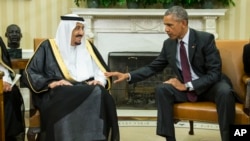 President Barack Obama, right, meets with King Salman of Saudi Arabia in the Oval Office of the White House, on Friday, Sept. 4, 2015, in Washington. The meeting comes as Saudi Arabia seeks assurances from the U.S. that the Iran nuclear deal comes with th