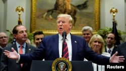 FILE - U.S. President Donald Trump delivers remarks in the Roosevelt Room at the White House in Washington, May 9, 2019.