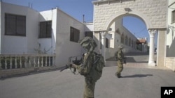 Israeli soldiers patrol in the village of Ghajar between northern Israel and Lebanon, 10 Nov 2010