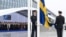 Officials hoist the Swedish national flag on a pole during a flag raising ceremony for Sweden's accession to NATO at the North Atlantic Alliance headquarters in Brussels, on March 11, 2024.
