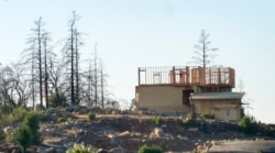 In this Nov. 5, 2019, photo, a new home construction project sits on a hilltop in Santa Rosa, Calif. Many homes in the city were destroyed during the Tubbs Fire of 2017.