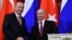 FILE - Russian President Vladimir Putin, right, shakes hands with Turkey's President Recep Tayyip Erdogan after their joint news conference following the talks in the Kremlin in Moscow, Russia, Jan. 23, 2019. 