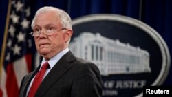 FILE - U.S. Attorney General Jeff Sessions is pictured at a news conference at the Department of Justice in Washington, Dec. 15, 2017. Sessions has ordered the creation of a task force to examine how his department can better combat cyberthreats.