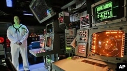 A US sailor looks on from his station next to the weapons control deck of the USS Monterey, carrying AEGIS class ballistic missile defense technology, in the Black Sea port of Constanta, Romania, June 7, 2011 (file photo)