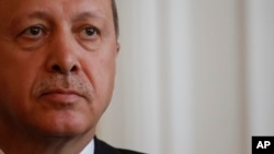 Turkish President Recep Tayyip Erdogan addresses journalists during a press conference in the Bosnian capital of Sarajevo, May 20, 2015. 
