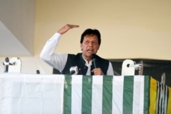 Pakistan's Prime Minister Imran Khan speaks during a rally in Muzaffarabad, Sept. 13, 2019.