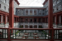 FILE - A courtyard is seen at Tsinghua University in Beijing, Sept. 10, 2016.
