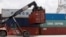 Các container của các hãng China Shipping và Cosco được xếp dỡ tại một cảng ở thành phố Hồ Chí Minh, Việt Nam, hồi tháng 7/2018 