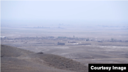 A view of the IS-held Iraqi town of Hawija as seen from a nearby Kurdish frontline on Oct. 12, 2016. (image courtesy of Dilshad Anwar)