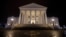 The State Capitol is illuminated in Richmond, Va., Feb. 6, 2019. 