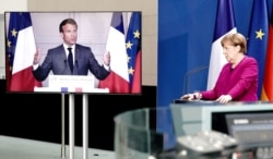 FILE - German Chancellor Angela Merkel holds a joint video news conference with French President Emmanuel Macron in Berlin, Germany, May 18, 2020.