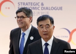 U.S. Treasury Secretary Jack Lew, left, and Chinese Vice Premier Wang Yang arrive at the Strategic and Economic Dialogue (S&ED) at the State Department in Washington, D.C., June 23, 2015.
