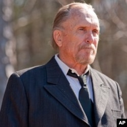 Robert Duvall as Felix Bush