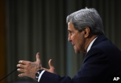 Secretary of State John Kerry testifies on Capitol Hill in Washington, Dec. 9, 2014, before the Senate Foreign Relations hearing on "Authorization for the Use of Military Force Against IS."