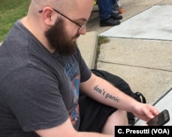 Matt (no last name given) waits for friends to march to the Boston Common. He's a war veteran and says "I don't want my country to look like this with so much hate and people who want to kill everyone else."