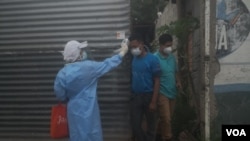 La doctora Rocío Rodríguez está en la primera línea de la lucha contra el COVID-19 atendiendo pacientes en Honduras. Foto Orcar Ortiz, VOA.