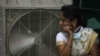 Punishing Heat Wave Sets Records Across Asia