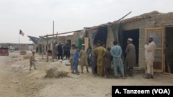 The local bazaar in Lataband Tangi was a row of dirty old brick rooms. Fruits and vegetables lay on the floor in piles of clear plastic bags.