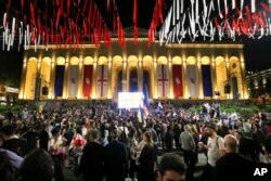 Demonstrators gather at the Parliamentary building during a protest against the foreign influence bill in Tbilisi, Georgia, on May 28, 2024. The Georgian parliament overrode a presidential veto of the legislation.