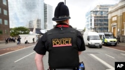 A police officer patrols the street in the London Bridge area of London, June 5, 2017.