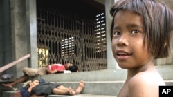 FILE - Social workers and police say Cambodia is fast gaining reputation as a haven for child sex, with boys and girls, driven into the business by their poverty-stricken parents and guardians.