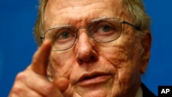 FILE - Michael Kirby, Chairperson of the Commission of Inquiry on Human Rights in North Korea, gestures during a news conference after delivering his report to the U.N. Human Rights Council at the United Nations European headquarters in Geneva, Sept. 17, 2013. 