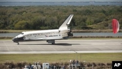 Space Shuttle Discovery (STS-133) lands at Kennedy Space Center in Cape Canaveral, Florida, completing its 39th and final flight, March 9, 2011